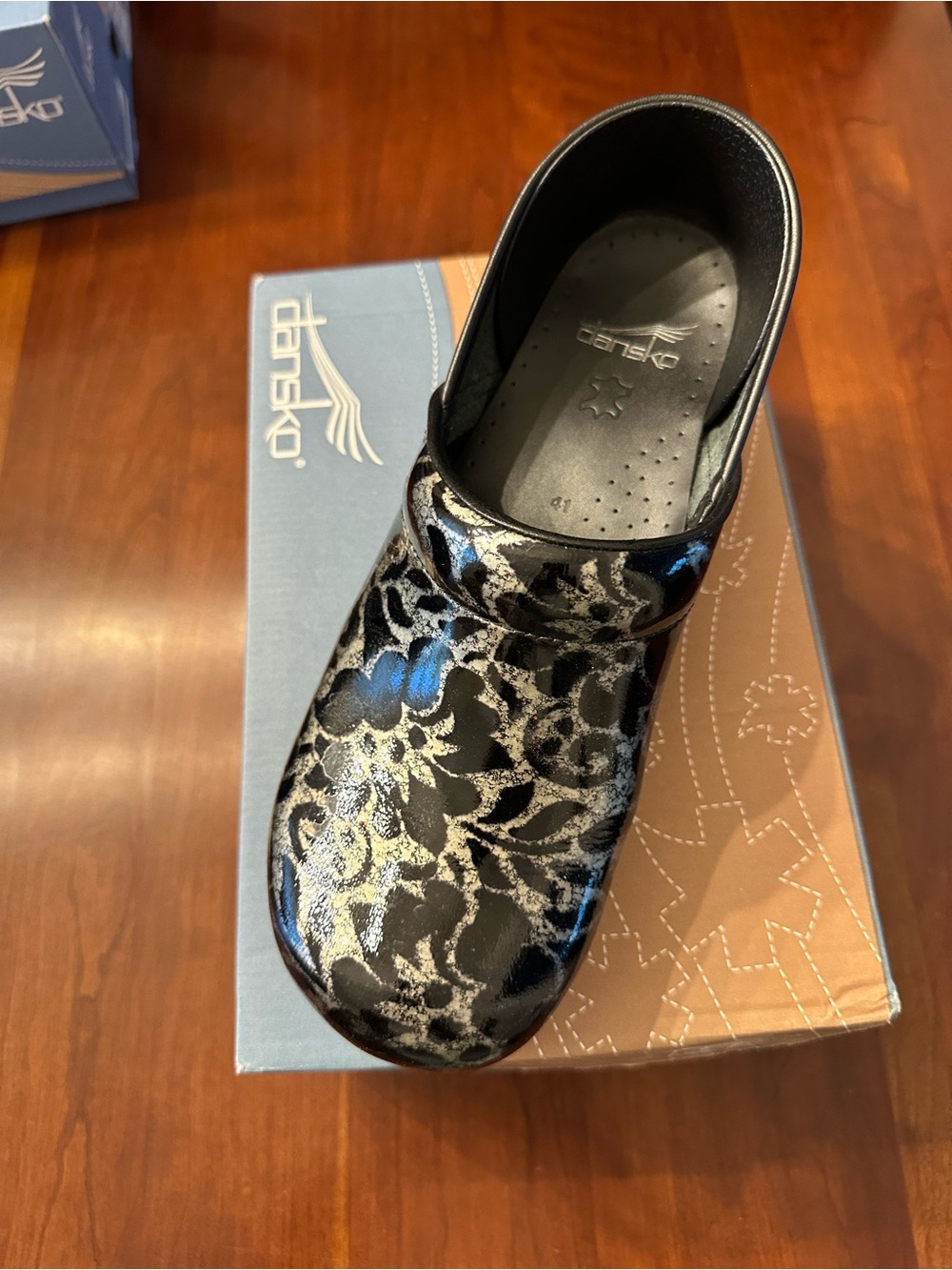 Dansko Black Clog with Silver Floral Metallic Overlay